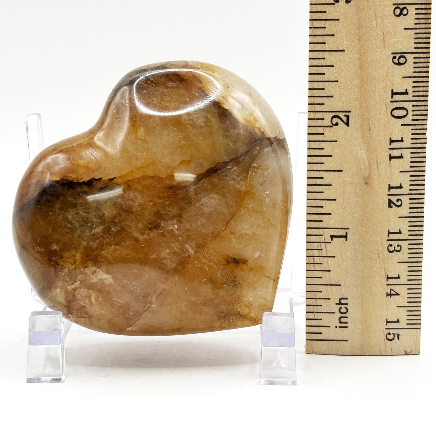 Natural polished heart-shaped Golden Healer Quartz crystal gemstone, ideal for meditation, energy healing and elegant home decor - RSH319