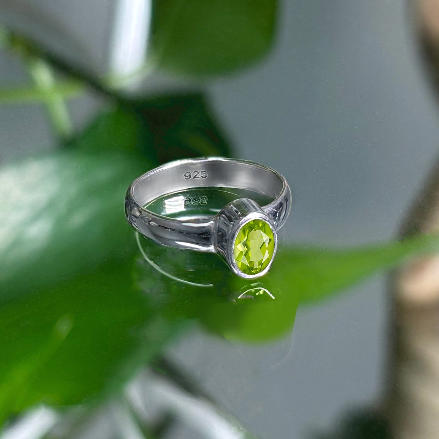 9mm x 7mm Oval Peridot Gemstone Solitaire Ring in .925 Sterling Silver