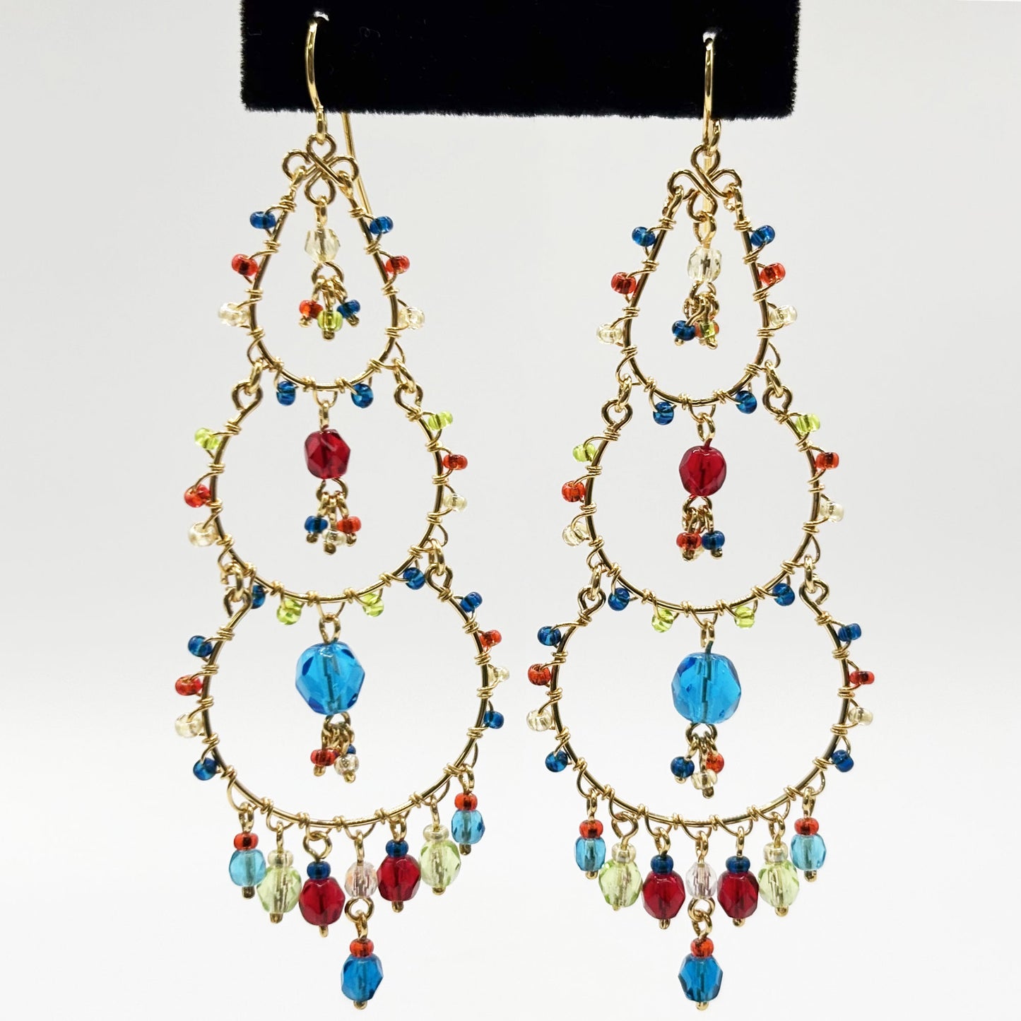 Gold Tone Tiered Chandelier Earrings with Blue Fire Polished Beads Statement Dangle Jewelry