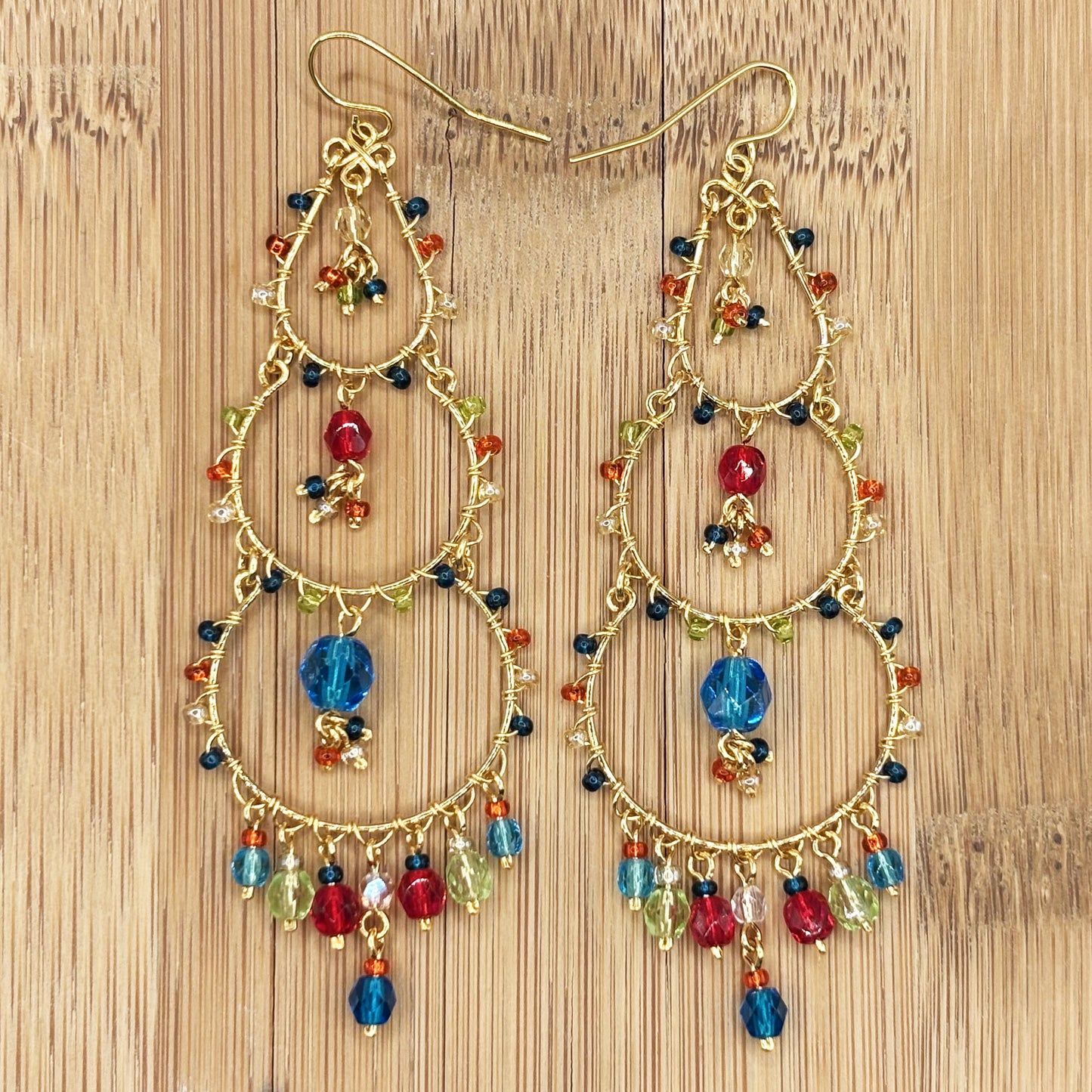 Gold Tone Tiered Chandelier Earrings with Blue Fire Polished Beads Statement Dangle Jewelry