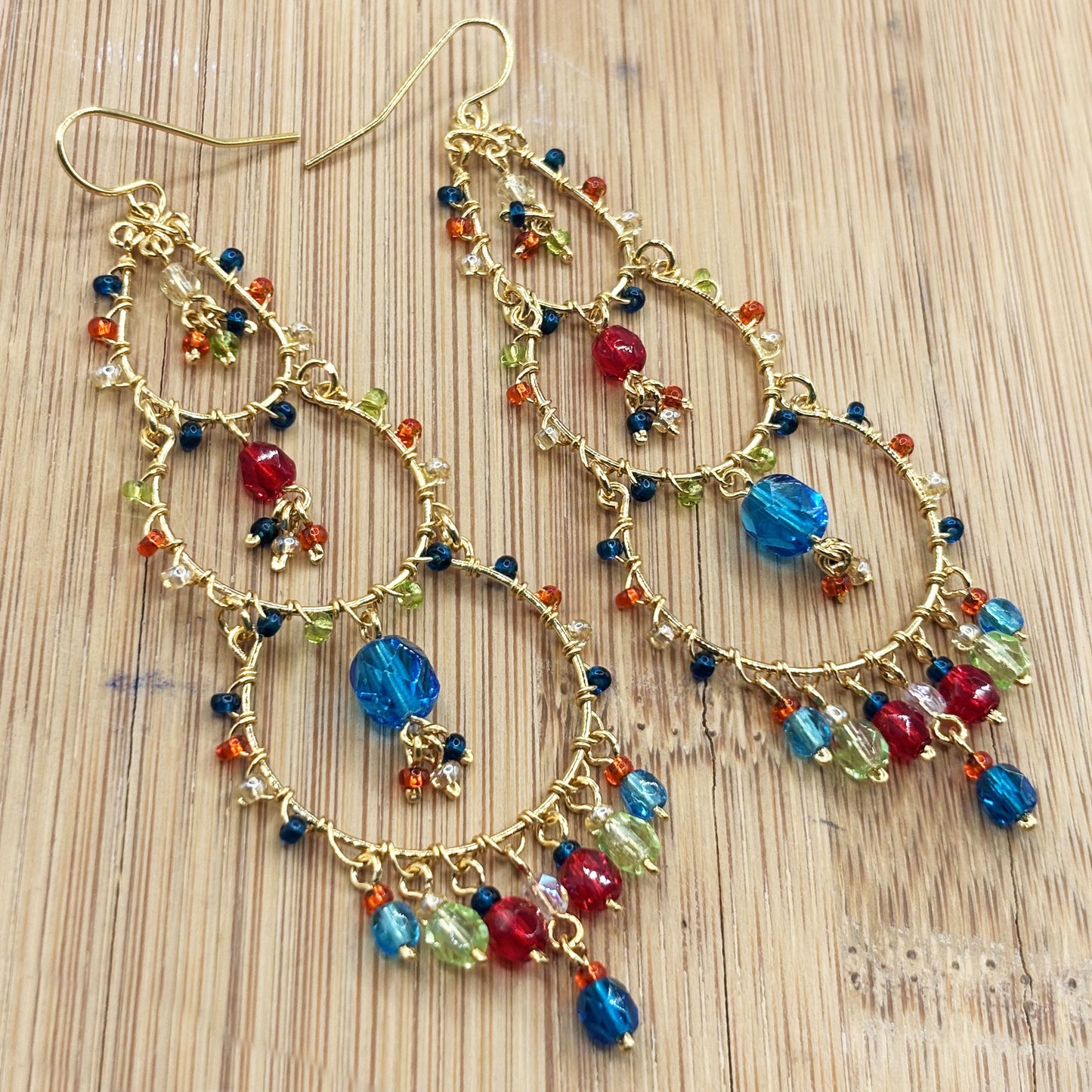 Gold Tone Tiered Chandelier Earrings with Blue Fire Polished Beads Statement Dangle Jewelry