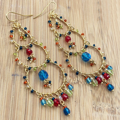 Gold Tone Tiered Chandelier Earrings with Blue Fire Polished Beads Statement Dangle Jewelry