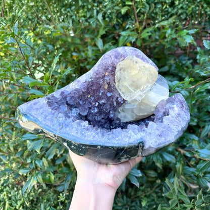 Natural Amethyst and Calcite Crystal Geode on Stand - Gem Avenue Retail