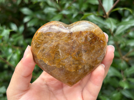 Natural polished heart-shaped Golden Healer Quartz crystal, perfect for meditation, healing and elegant decor - RSH316