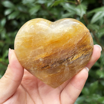 Natural Golden Healer Quartz heart-shaped polished gemstone, ideal for meditation, energy balance and decorative use - RSH317