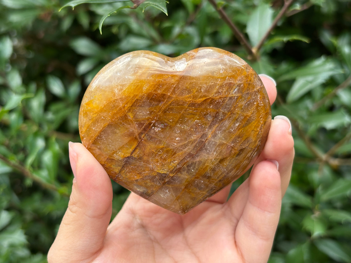 Natural polished heart-shaped Golden Healer Quartz crystal gemstone, perfect for meditation, energy healing and elegant decor - RSH318