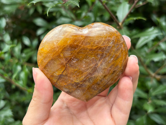 Natural polished heart-shaped Golden Healer Quartz crystal gemstone, perfect for meditation, energy healing and elegant decor - RSH318