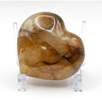 Natural polished heart-shaped Golden Healer Quartz crystal gemstone, ideal for meditation, energy healing and elegant home decor - RSH319