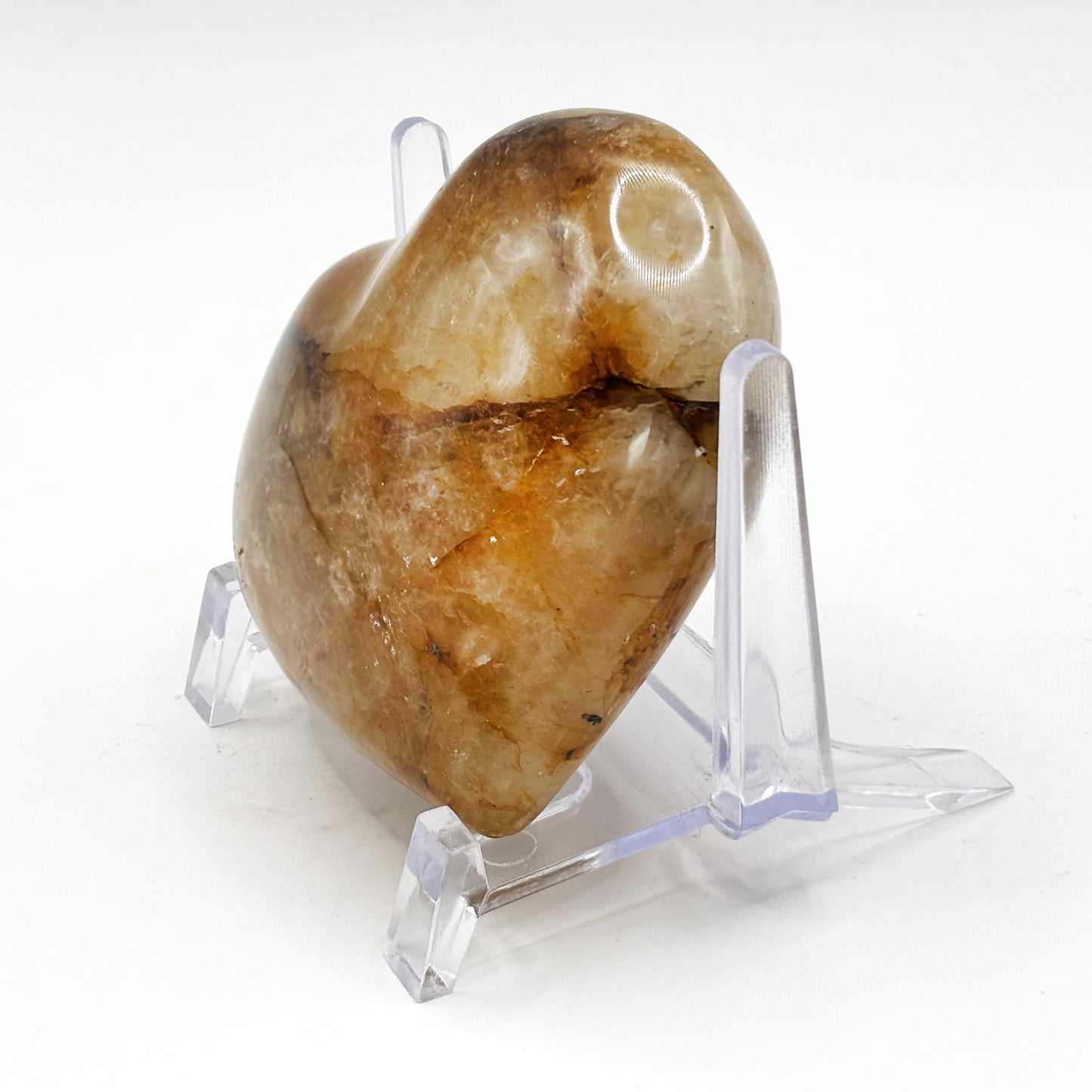 Natural polished heart-shaped Golden Healer Quartz crystal gemstone, ideal for meditation, energy healing and elegant home decor - RSH319