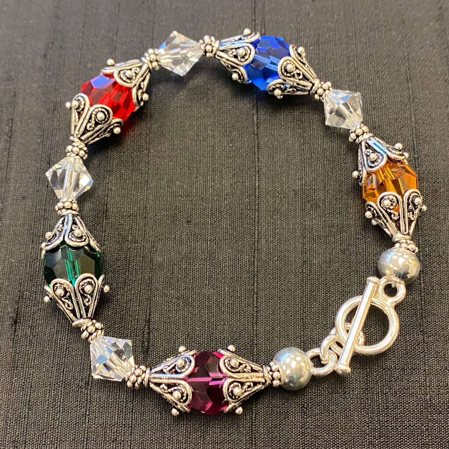 Sterling Silver Bracelet with Bali Bead Caps and Austrian Crystals