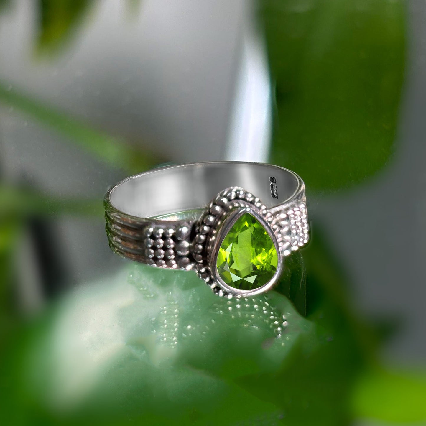 Pear Shape Peridot Gemstone Solitaire Ring in .925 Sterling Silver